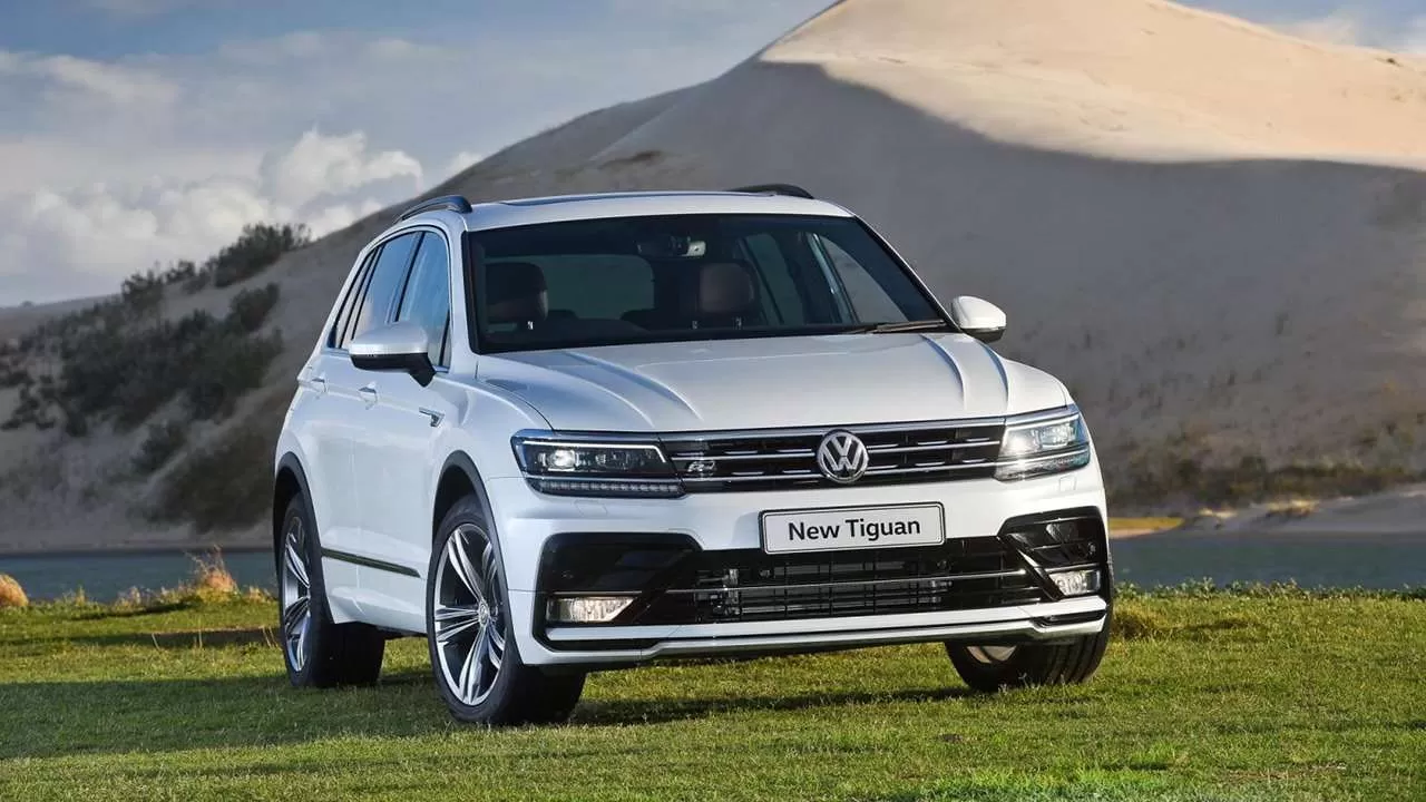 Volkswagen tiguan: поколения, кузова по годам, история модели и года выпуска, рестайлинг, характеристики, габариты, фото - carsweek